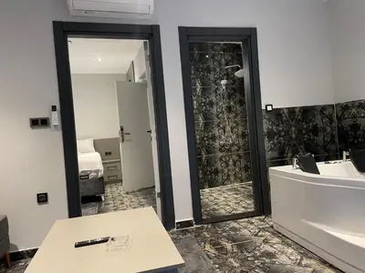 a bathroom with a sink and a mirror at CK Boutique Hotel in Istanbul