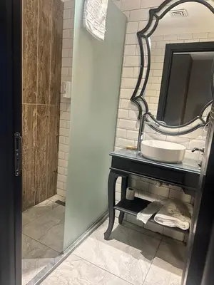 a bathroom with a sink and a mirror at SHERLOCK HOMES HOTELS in Istanbul