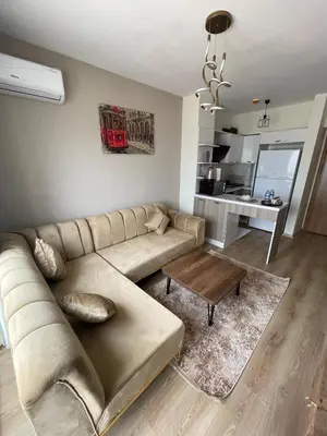 a living room with a couch and a table at Classic Suite MS34 in Istanbul