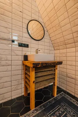 a bathroom with a sink and a mirror at Dark Sapanca in Sapanca