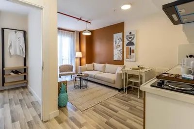 a living room with a couch and a table at Monnas Suite in Istanbul