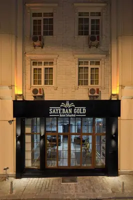 a building with a sign over the entrance to a restaurant at Sayeban Gold Hotel in Istanbul