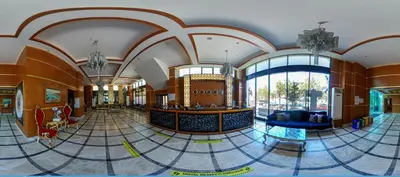 a large room with a lobby withwindows and a lobby at Vois Hotel Atasehir & SPA in Istanbul