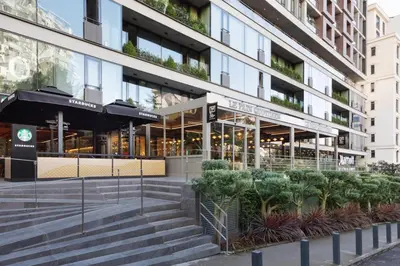 a facade of a building with stairs and plants at Marriott Executive Apartments Istanbul Fulya in Istanbul