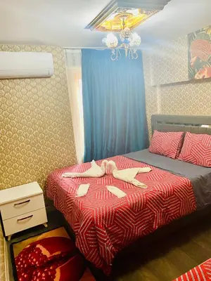 a bedroom with a bed with paper planes on it at White Suites Hotel İstanbul in Istanbul