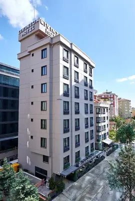 a tall white building with a lot of windows at Livinton İstanbul Ataşehir in Istanbul