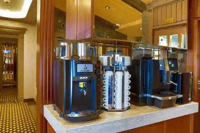 a group of water machines on a counter in a room at MANORS HOTEL in Istanbul