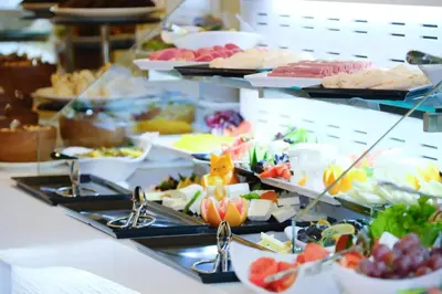 a buffet line with many different types of food at Dekalb Hotel in Istanbul