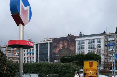 a pepsi sign in front of a building at Dekalb Hotel in Istanbul