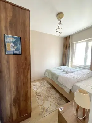 a bedroom with a bed next to a window at Classic Suite TS33 in Esenyurt