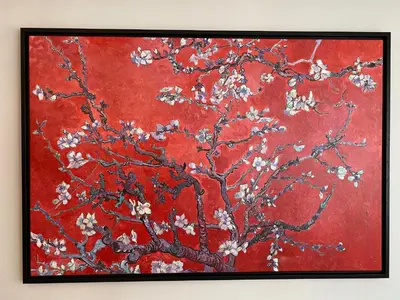 a painting of a tree with white flowers on a red background at Whole Apartment at The Heart of Sisli Nisantasi K in Istanbul