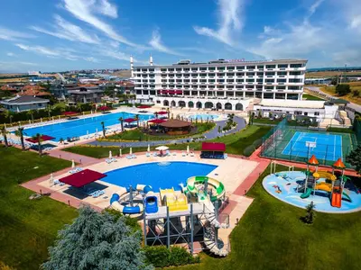 an aerial view of a hotel with a large swimming pool at Ramada Plaza by Wyndham Silivri in Silivri