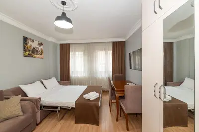 a living room with a couch and a table at Terra Apart Taksim in Istanbul
