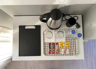 a kitchen counter top with a pot and pans at Li Hotel Pera in Istanbul