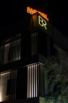 a lit up sign on the side of a building at BRANDROOM HOTEL in Istanbul