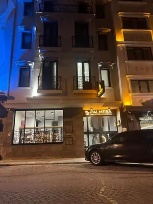 a car parked in front of a building at night at PALMERA HAGIA SOPHIA Hotel in Istanbul