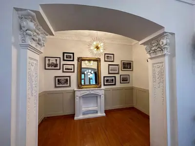 a hallway with a mirror on a wall at Botter Dream House in Istanbul