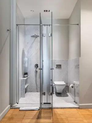 a bathroom with a shower and a toilet at DeCamondo Residence in Istanbul