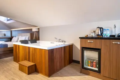 a kitchen with a sink and a fireplace at 216 Bosphorus in Istanbul