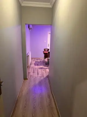 an empty hallway with a table in a room at Sami hotel in Istanbul