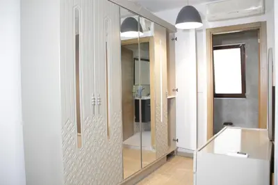 a bathroom with a glass shower and a sink at Solo Suites Hotel in Istanbul