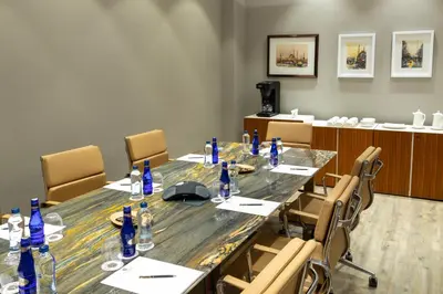a conference room with a long table and chairs at Hallmark Hotel & SPA Istanbul in Istanbul