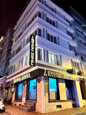 a large white building with a luxury hotel at EYFEL HOTEL in Istanbul