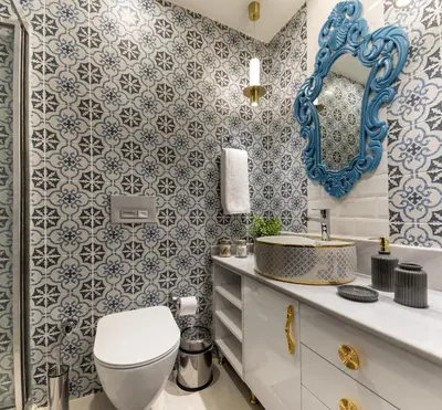 a bathroom with a toilet and a sink and a mirror at BayMari Suites City Life in Istanbul