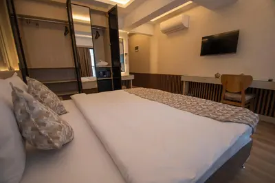 a hotel room with a bed and a television at Vera Life Hotel in Istanbul