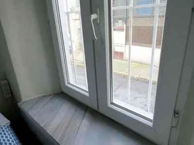 an open door with a window in a room at Istanberry - Royal Apartments in Istanbul