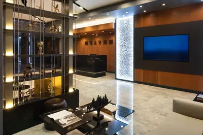 a living room with a tv and a couch at Nish Palace Beşiktaş in Istanbul