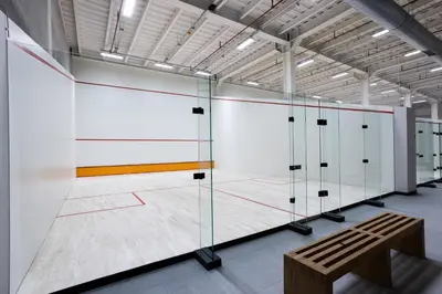 a basketball court with a bench in a building at INVENTIST Hotel Sports Academy Istanbul in Istanbul