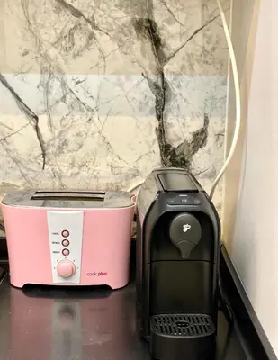 a toaster and a toaster sitting on a counter at Unique/Cosy flat near Taksim/Nişantaşı in Istanbul