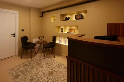 a bar with chairs and a table in a room at CASA GALATA 35 in Istanbul