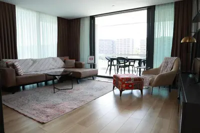 a living room with a couch and a table at Lovely Two Bedroom Appartment Istanbul in Istanbul