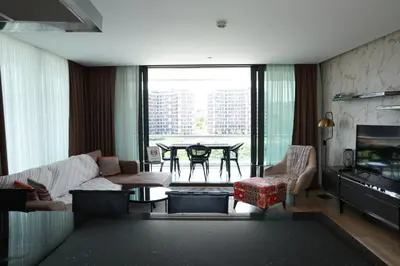 a living room with a couch and a table with a view at Lovely Two Bedroom Appartment Istanbul in Istanbul