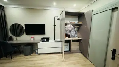 an office with a desk and a computer in a room at The House Company in Istanbul